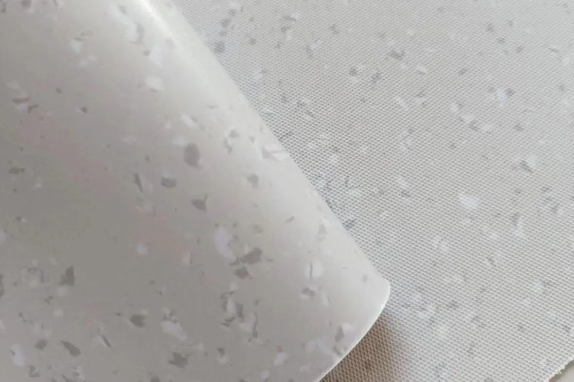 Compacted homogeneous floor covering